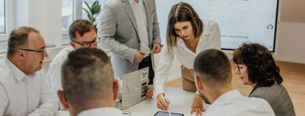People working at the mergers and acquisitions process
